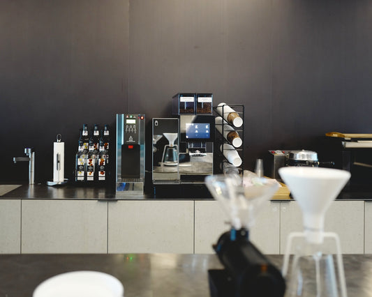 a coffee machine sitting on top of a counter