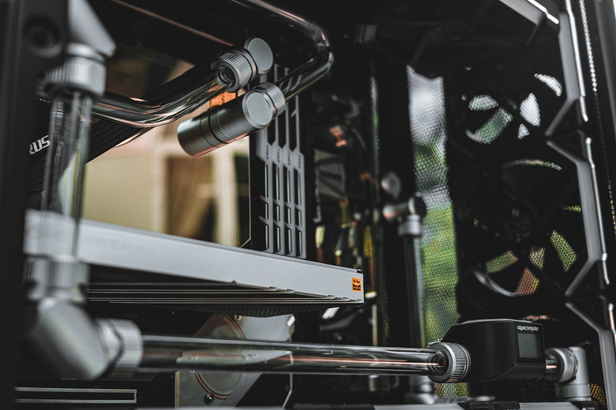 a close up of a computer case with a fan